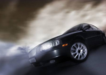 bigstockphoto_Car_On_The_Move_514824
