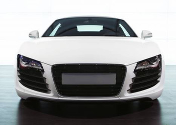 bigstockphoto_Foreground_Of_White_Sportcar_A_3928065